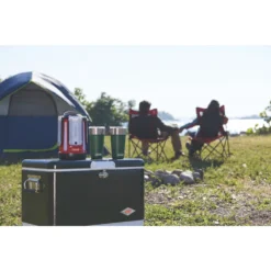 Coleman Sundome® 3-Person Camping Tent -Outland Supply 2000024582 coleman sundome tent couple at campfire with talent in use 1